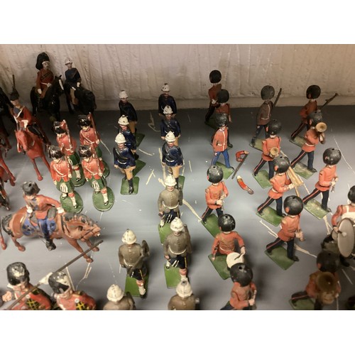 348 - A large collection of Britains and earlier hand painted lead toy soldiers, see all images. Some cond... 