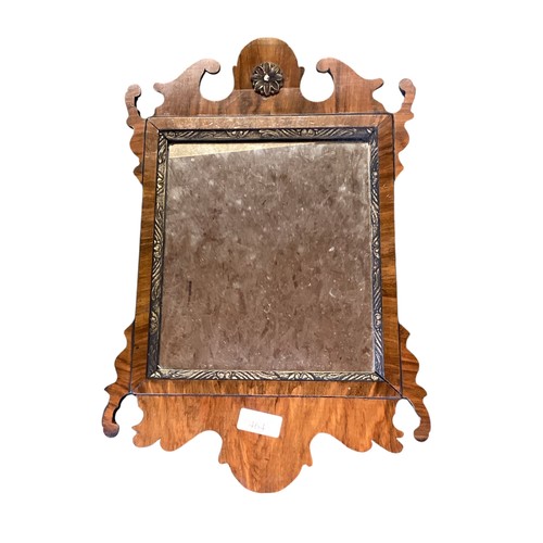 464 - A small veneered pier glass together with a partial gilt framed wall mirror. Largest: 49cm x 39cm.