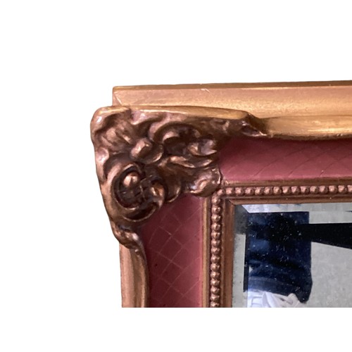 464 - A small veneered pier glass together with a partial gilt framed wall mirror. Largest: 49cm x 39cm.