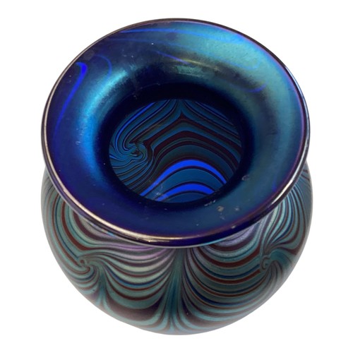 336 - An Okra iridescent glass vase. Etched signature to base dated 87. 12cm(h)