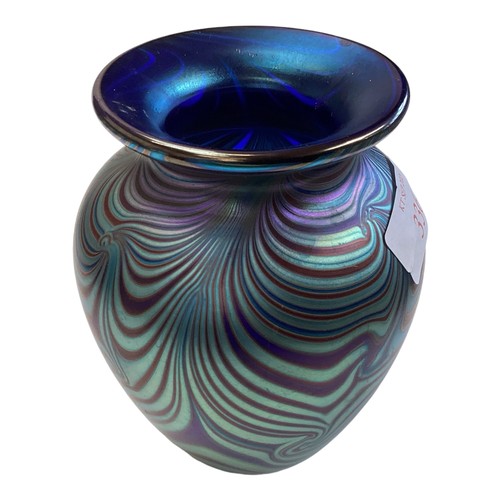 336 - An Okra iridescent glass vase. Etched signature to base dated 87. 12cm(h)