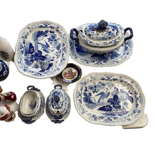 334 - A mixed collection of china to include a blue and white meat platters tureens , and other items.