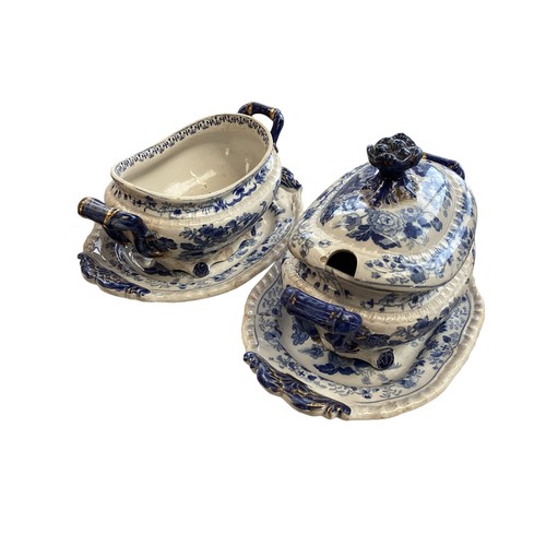 334 - A mixed collection of china to include a blue and white meat platters tureens , and other items.