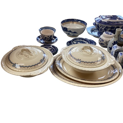 334 - A mixed collection of china to include a blue and white meat platters tureens , and other items.