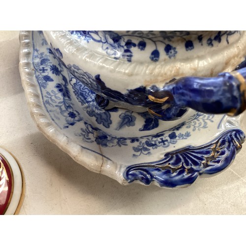 334 - A mixed collection of china to include a blue and white meat platters tureens , and other items.