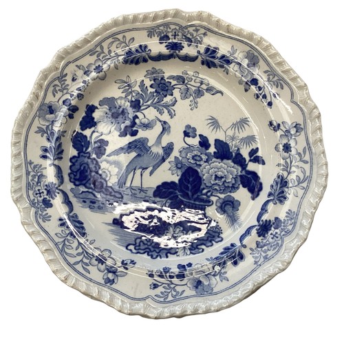 335 - A mixed collection of blue and white and oriental style ceramic items.