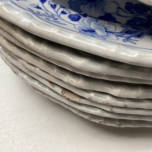 335 - A mixed collection of blue and white and oriental style ceramic items.