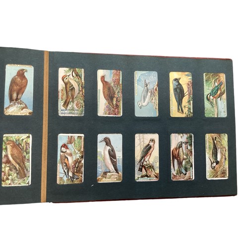 330 - A collection of cigarette cards and 20th century UK coinage.