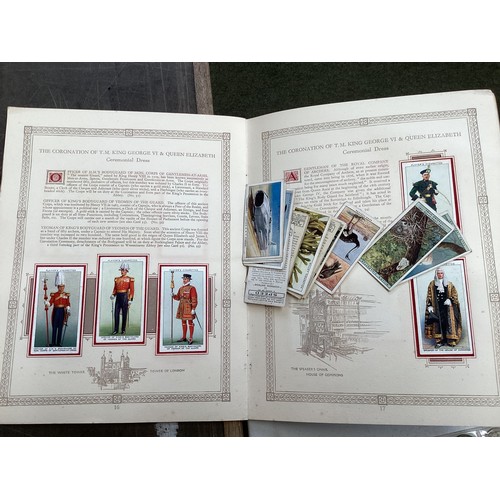 330 - A collection of cigarette cards and 20th century UK coinage.