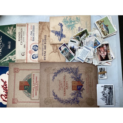 330 - A collection of cigarette cards and 20th century UK coinage.