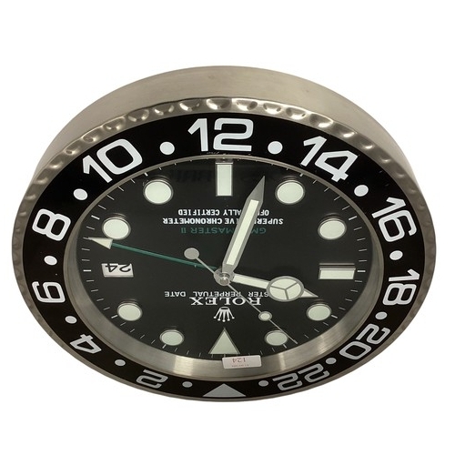 124 - A Rolex Oyster perpetual GMT Master II wall clock. 34cm