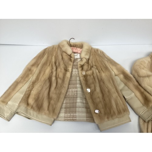 302 - A ladies cream leather and fur bomber jacket Gerhardt Kansas City label (wear to the lining); a thre... 