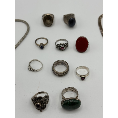 48 - A collection of sterling silver and unmarked white metal jewellery items.