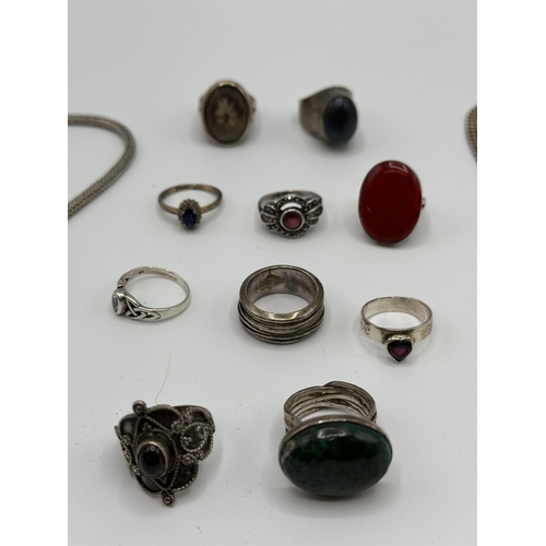 48 - A collection of sterling silver and unmarked white metal jewellery items.