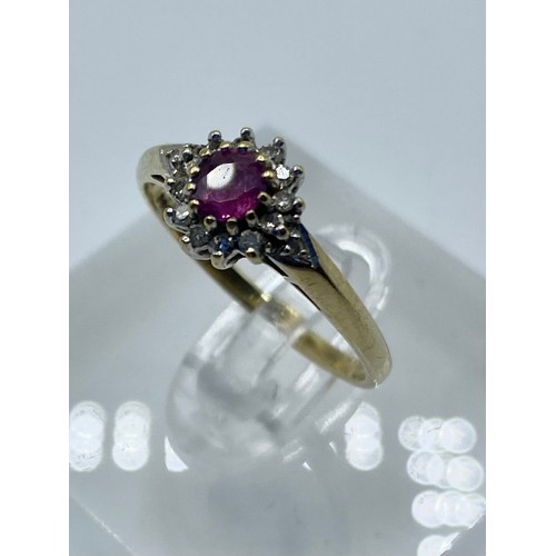 60 - A 9ct gold ruby and diamond set flower ring. Size P. 0.80g and A graduated amber bead necklace. 56cm... 