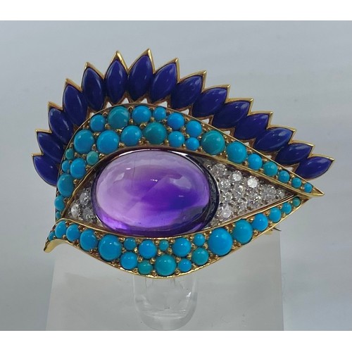 1 - Cartier. A Cartier eye brooch, enamel turquoise amethyst and diamond to a yellow and white metal mou... 