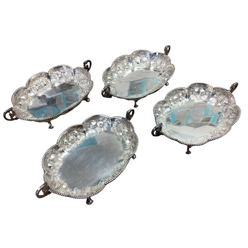 19 - A collection of silver plated wares to include a set of four sweet meat dishes, two tea sets and a l... 