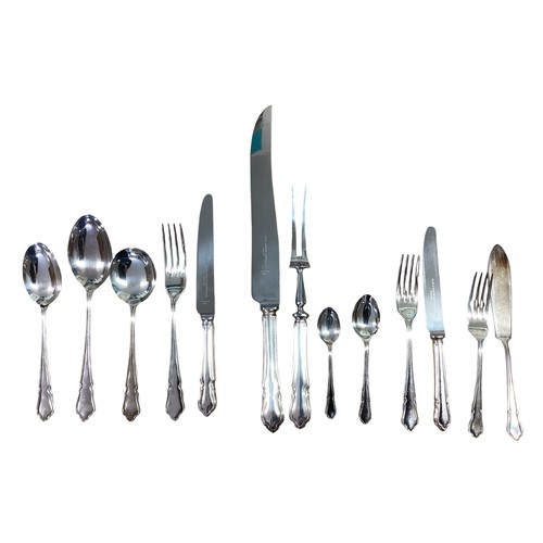 12 - A 12 person canteen of silver plated cutlery.