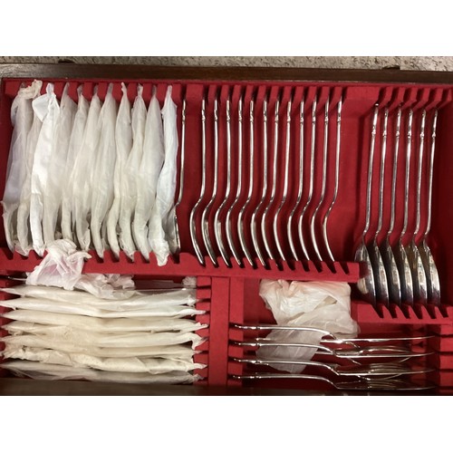 12 - A 12 person canteen of silver plated cutlery.