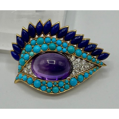 1 - Cartier. A Cartier eye brooch, enamel turquoise amethyst and diamond to a yellow and white metal mou... 