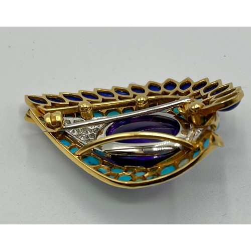 1 - Cartier. A Cartier eye brooch, enamel turquoise amethyst and diamond to a yellow and white metal mou... 