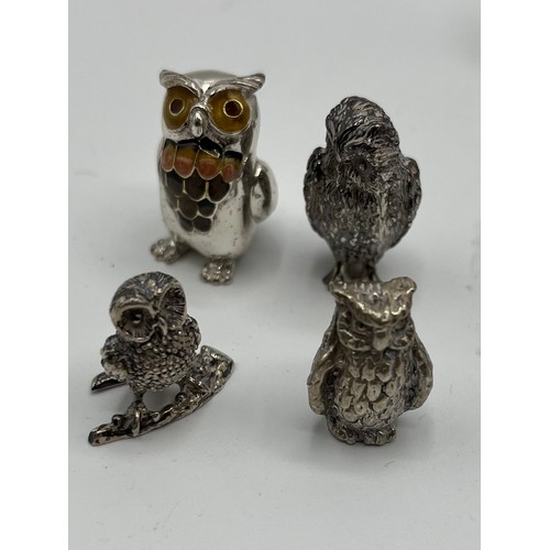 7 - A collection of sterling silver miniature items. Mostly cast animals with with  a Lincoln imp , rock... 