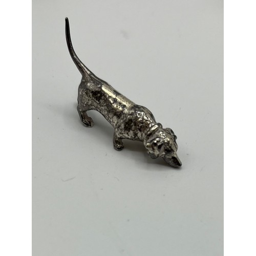 7 - A collection of sterling silver miniature items. Mostly cast animals with with  a Lincoln imp , rock... 