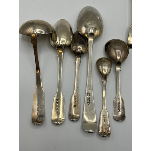 85 - A collection of 19th century sterling silver Georgian flatware. Various dates and makers. 392g.