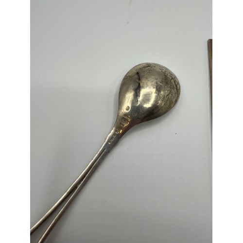 94 - A Georg Jensen 925s silver spoon together with a sterling silver pickle fork. 73g.