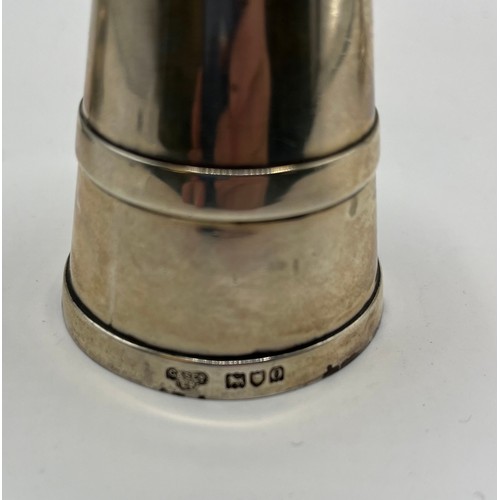 83 - A collection of sterling silver items , a mustard and pepper grinder by Goldsmiths silversmiths Comp... 