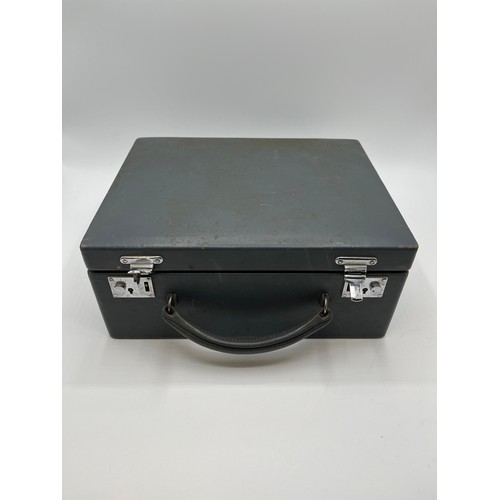 84 - Asprey London . A mid 20th century faux leather ladies dressing table travel case. Complete with ful... 