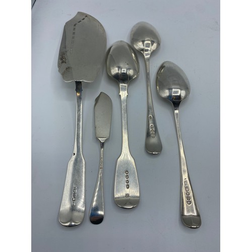 125 - A collection of sterling silver flat ware to include Georgian and later items , fish slice tea spoon... 