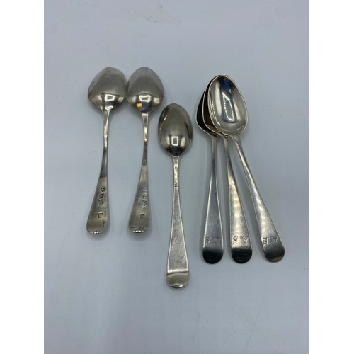 125 - A collection of sterling silver flat ware to include Georgian and later items , fish slice tea spoon... 