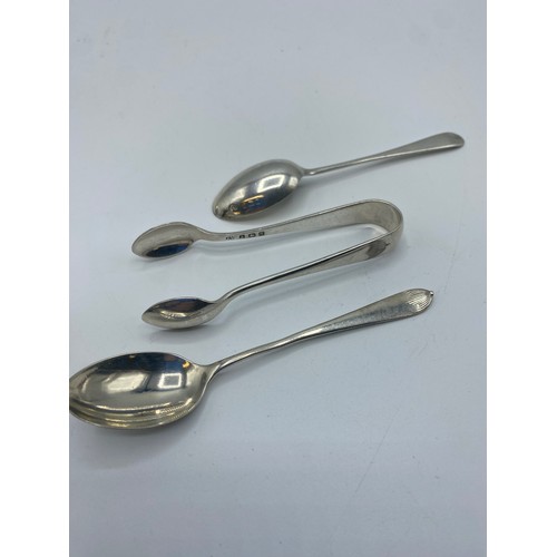 125 - A collection of sterling silver flat ware to include Georgian and later items , fish slice tea spoon... 