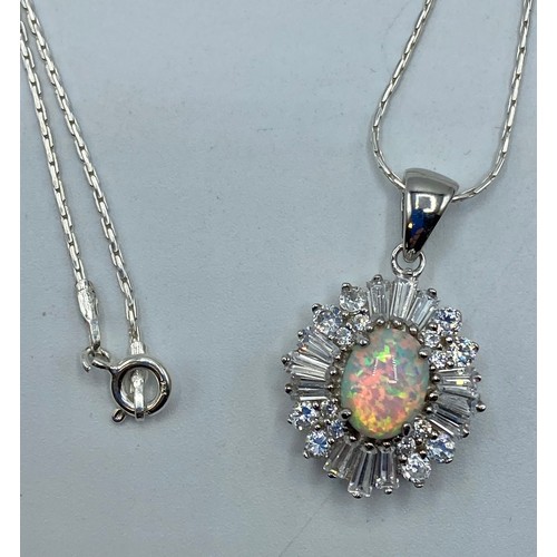 156 - A 925 silver and  opal set reconstituted pendant with 925 silver chain.