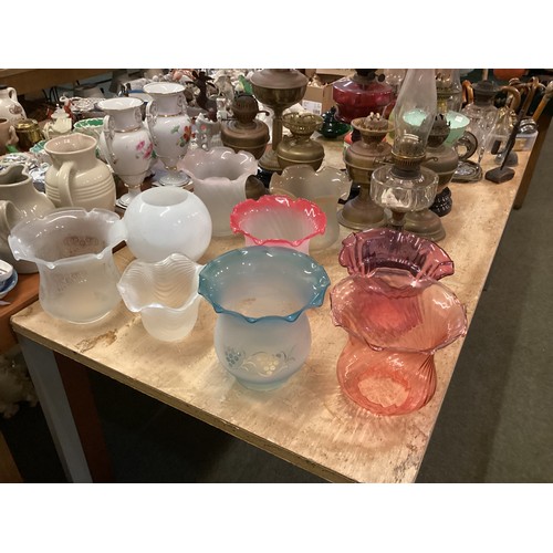 189 - A quantity of C20th oil lamps, and modern glass shades, etc, see all images. All sold as seen and as... 