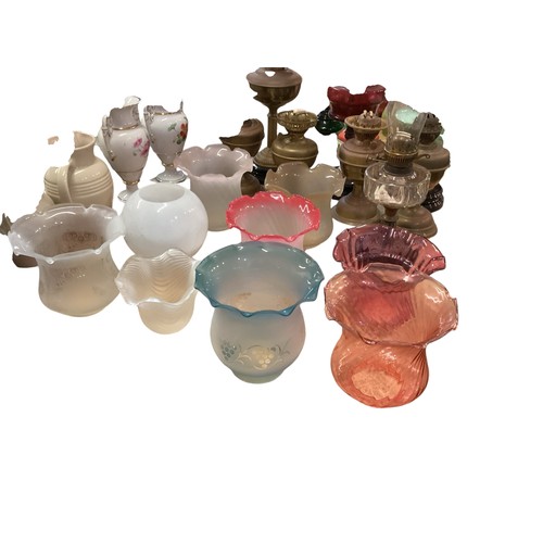 189 - A quantity of C20th oil lamps, and modern glass shades, etc, see all images. All sold as seen and as... 