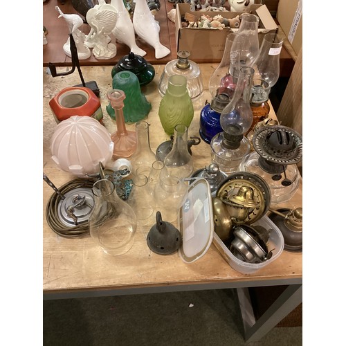 188 - A quantity of hand held oil lamps, and other various miscellaneous accessories and parts, see all im... 