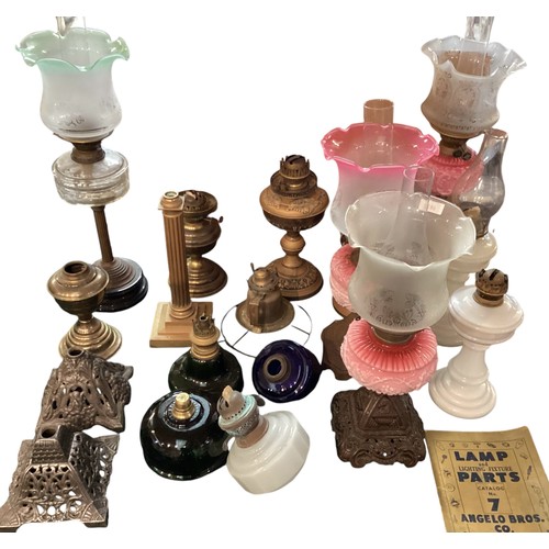 186 - A quantity of early C20th and later oil lamps, stands, resevoirs etc, see all images. All sold as se... 