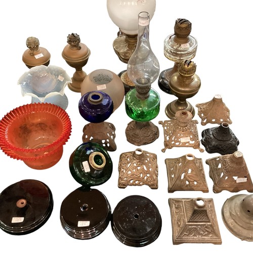 187 - A quantity of early C20th and later oil lamps, stands, resevoirs, modern glass shades, etc, see all ... 