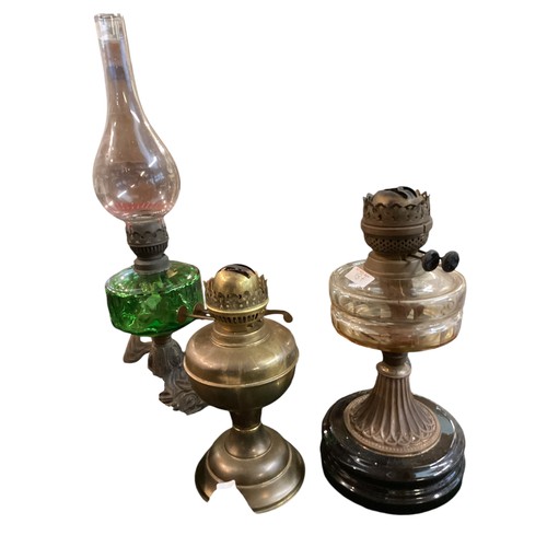 187 - A quantity of early C20th and later oil lamps, stands, resevoirs, modern glass shades, etc, see all ... 