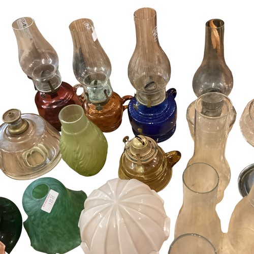 188 - A quantity of hand held oil lamps, and other various miscellaneous accessories and parts, see all im... 