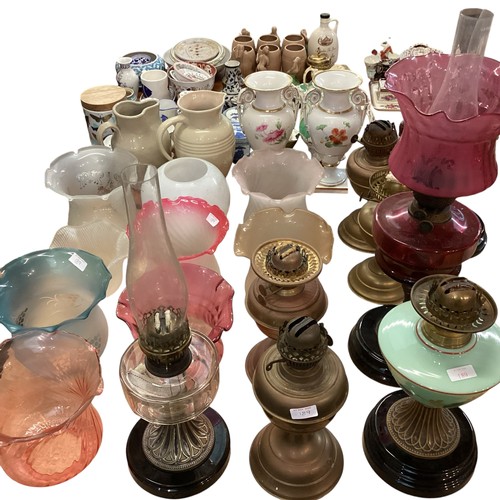 189 - A quantity of C20th oil lamps, and modern glass shades, etc, see all images. All sold as seen and as... 