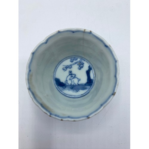 185 - A blue and white Chinese export porcelain bowl, approx 6cm diameter, bears old label to base c 1750.... 