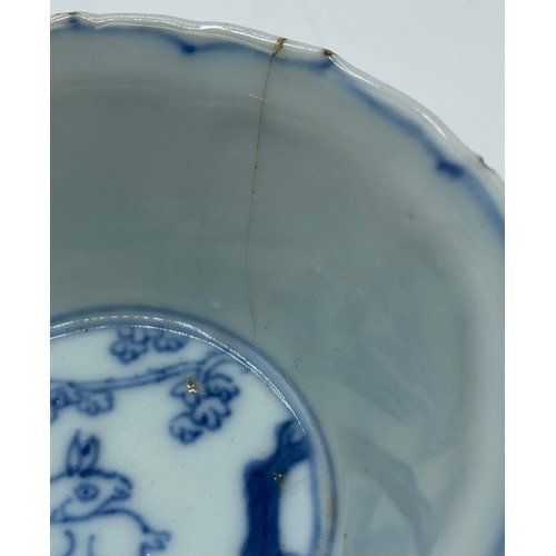 185 - A blue and white Chinese export porcelain bowl, approx 6cm diameter, bears old label to base c 1750.... 