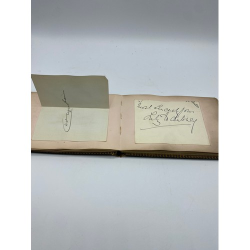 195 - An Autograph book, with letter from Winston Churchill. on headed note paper, 105 Mount Street, Nov 1... 