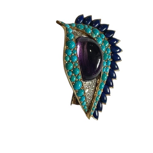 1 - Cartier. A Cartier eye brooch, enamel turquoise amethyst and diamond to a yellow and white metal mou... 