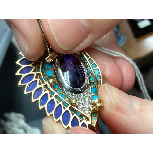 1 - Cartier. A Cartier eye brooch, enamel turquoise amethyst and diamond to a yellow and white metal mou... 