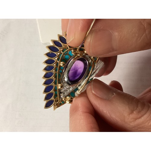 1 - Cartier. A Cartier eye brooch, enamel turquoise amethyst and diamond to a yellow and white metal mou... 