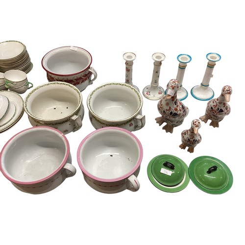 219 - A quantity of china to include Chamber Pots, Candle Sticks, Imari Palette ducks, a pair of Soho Pott... 